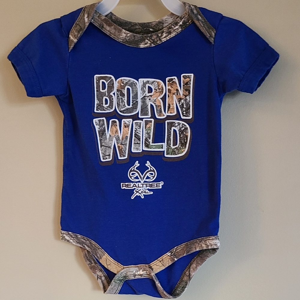 Realtree "Born Wild" blue onesie/bodysuit with camo lettering and trim